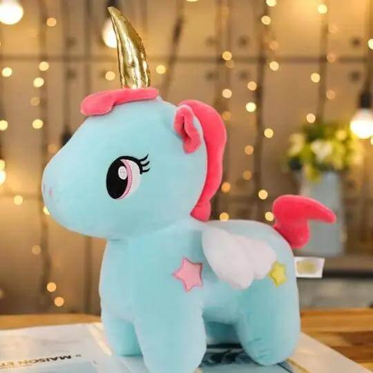 Peluche licorne rose et aile blanche – Monde à maman