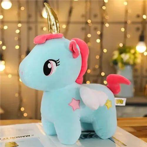Peluche licorne bleue avec oreilles roses – Monde à maman
