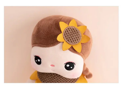 Poupée chiffon avec belle fleur dans les cheveux – Monde à maman