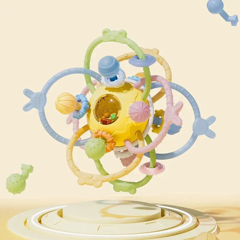 Hochet bébé - Monde à maman