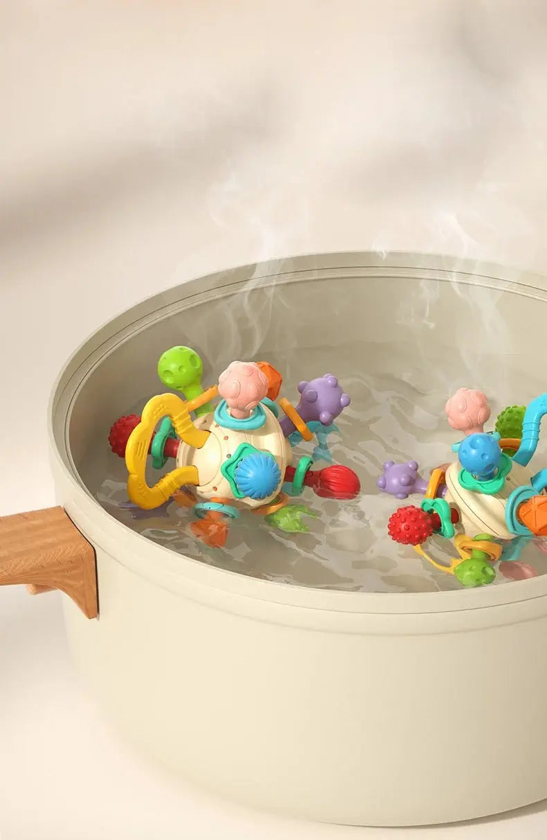 Hochet bébé - Monde à maman