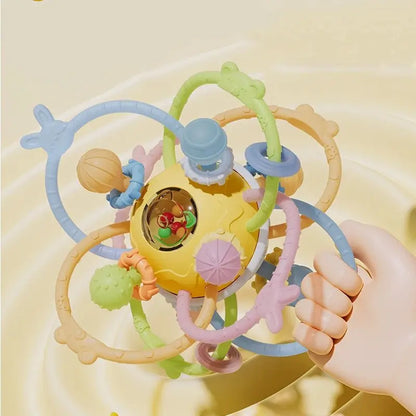 Hochet bébé - Monde à maman