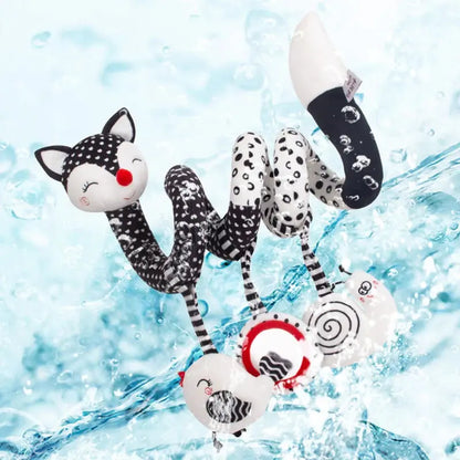 Hochet suspendu - Monde à maman