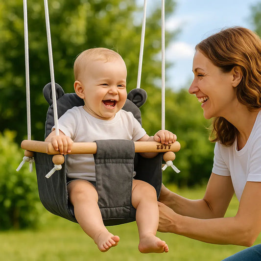 maman et bébé dans une balancoire - monde a maman
